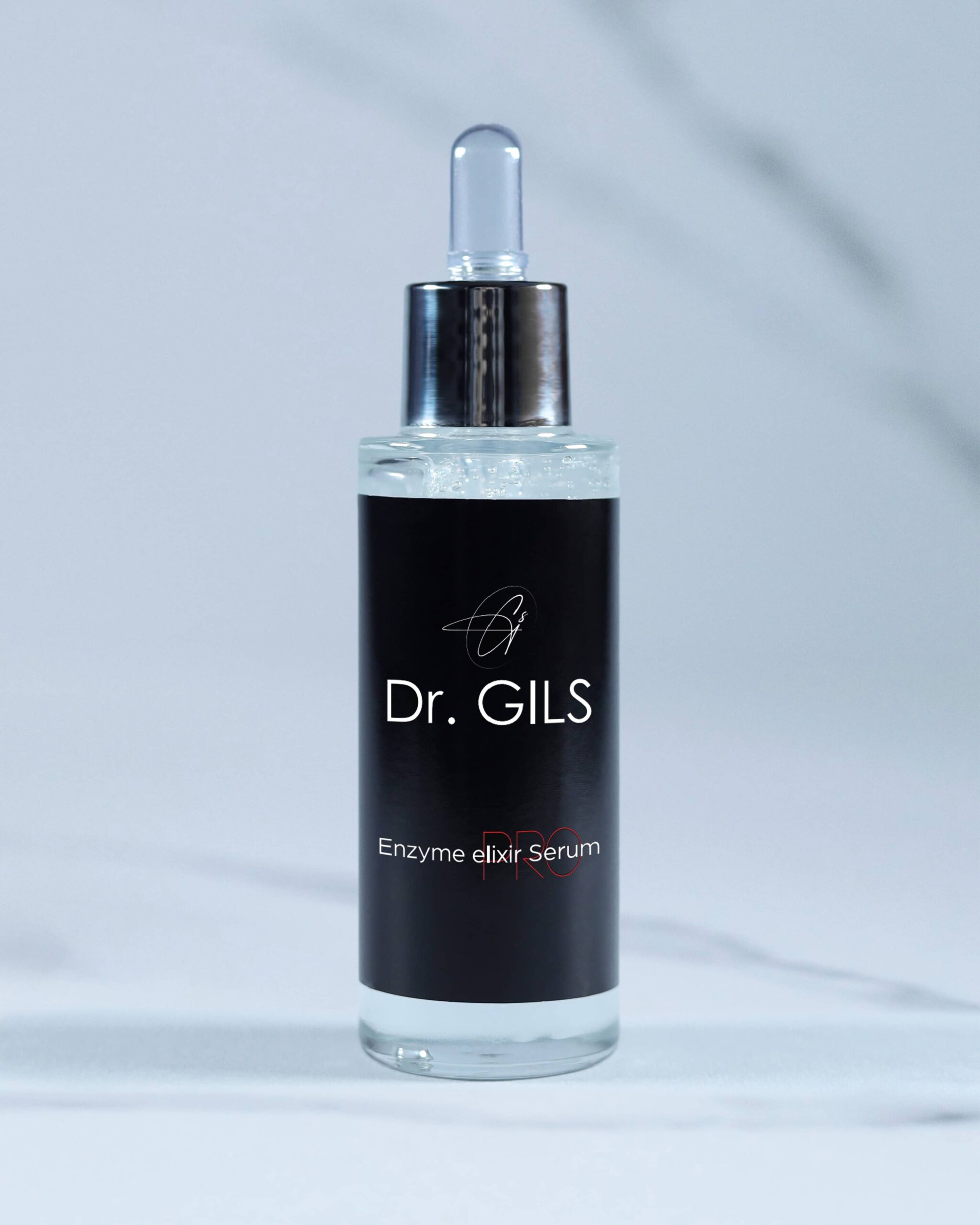 Dr. GILS Enzyme Elixir Serum sa enzimima za obnavljanje i čišćenje kože, u staklenoj flašici sa pipetom